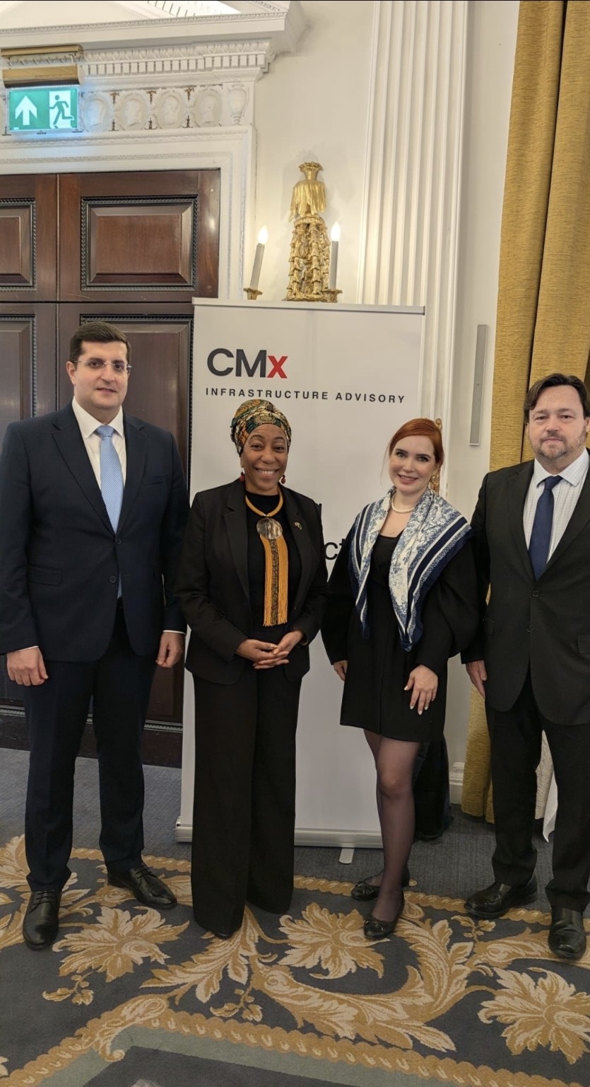 Four FutureScape 2026 guests photographed in front of the CMx banner