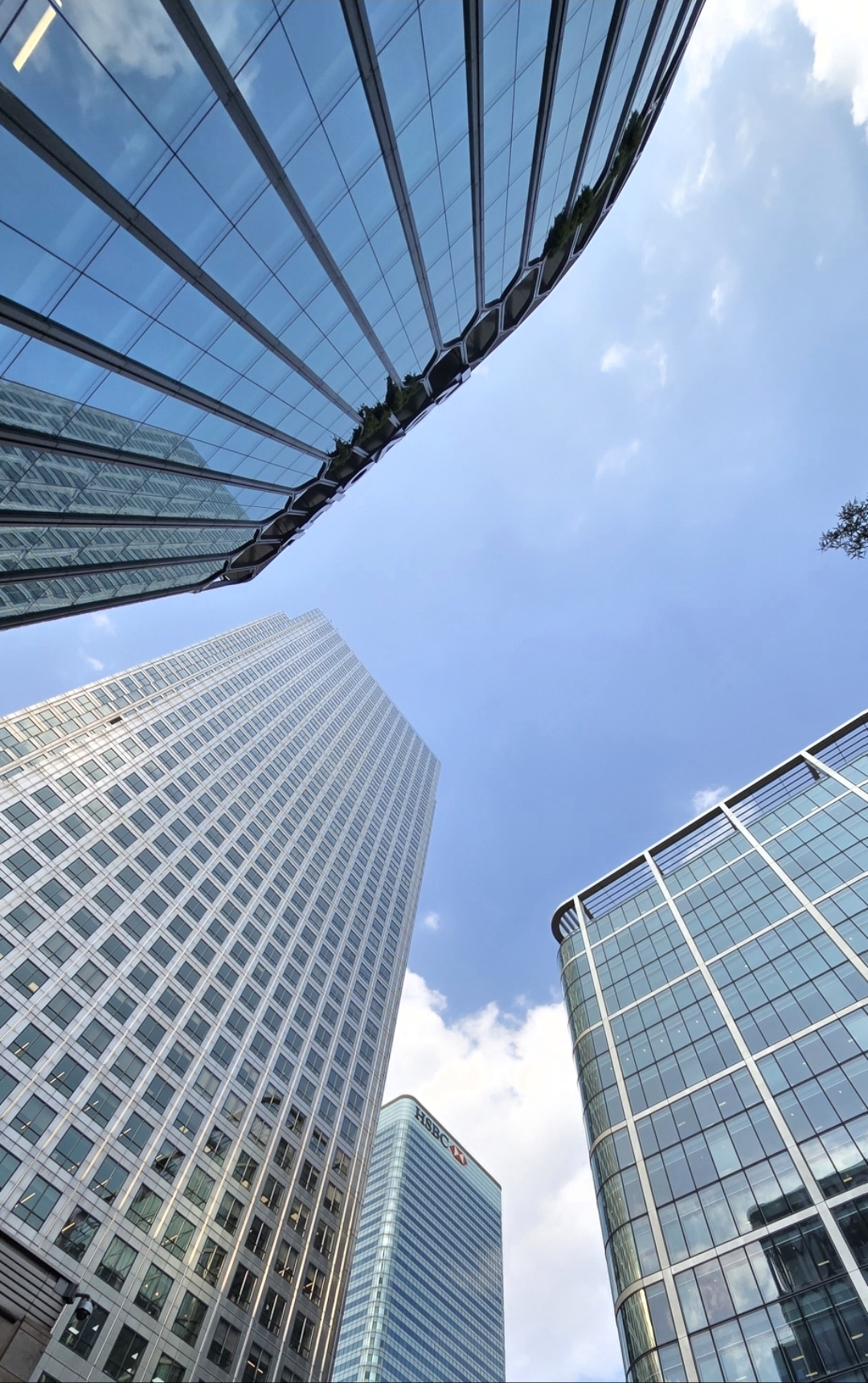 Upward view of high-rise buildings against a clear sky